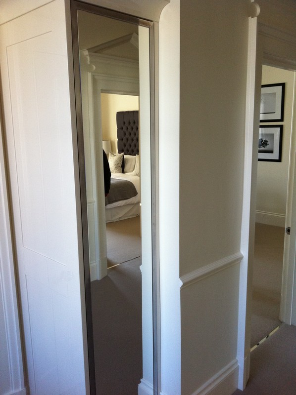 Full-length wardrobe mirror fitted in London home
